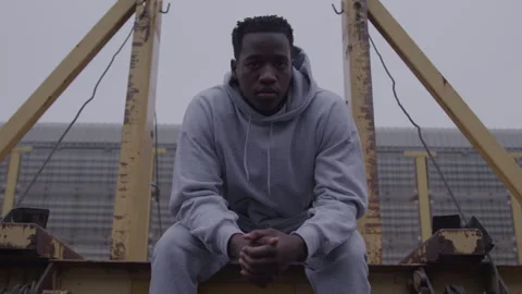 Young Guy Sits In Sweatsuit On Train Stock Footage 270326082
