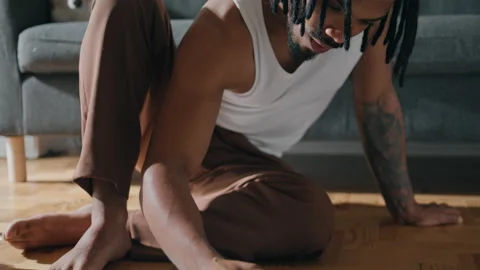 Young guy sketching paper at flat closeup. Black hair artist preparing painting Stock Footage 229406231