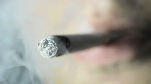 Young guy smokes cigarette closeup Video stock 59099973