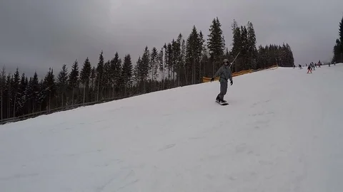 Young guy is snowboarding. Video stock 74701183