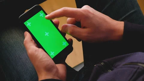 Young guy student leaf through the pages of a web site Stock Footage 103692549