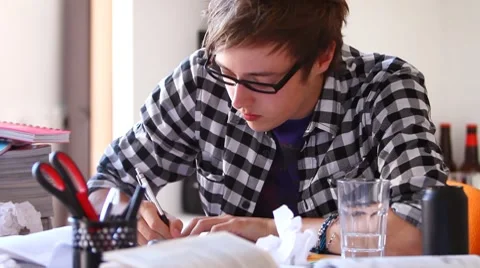 Young guy studying at home Stock Footage 8509232