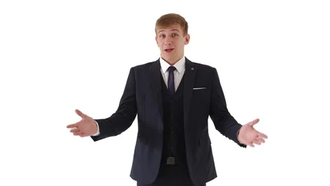 Young guy in a suit and tie on a white background makes a gesture with his hands Stock Footage 134316239