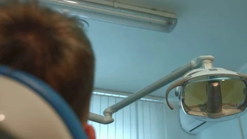Young guy on the survey at the dentists. Video stock 70965867