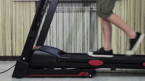 Young guy takes out of the box children's soft toys sitting on the floor Stock Footage 201103311