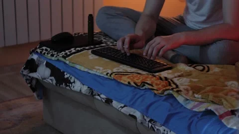 The young guy typed on the keyboard Stock Footage 131360626
