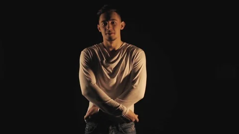 Young guy undresses Stock Footage 100167927