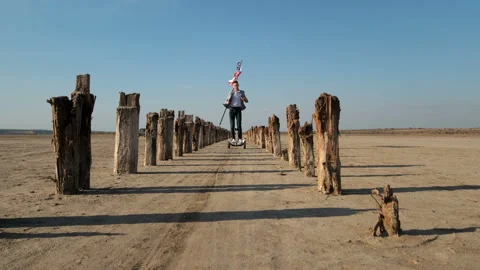 Young guy with the USA flag in his hands. Stock Footage 137949043