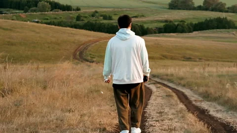 Young guy on a walk in nature, alone. outdoors. Stockbeeldmateriaal 162263254