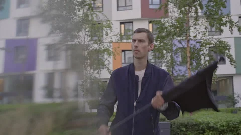 Young guy waving a black flag Stockbeeldmateriaal 156002216