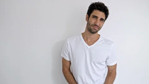 Young guy in white Stock Footage 89477167