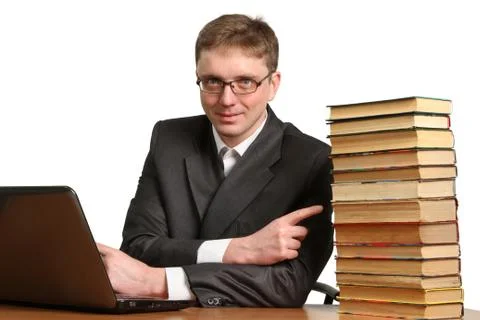 Young guy working at a laptop Stock Photos