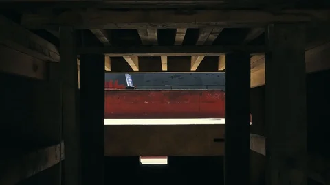 Young guys jumping and doing tricks on a scooter in a skatepark Video stock 94142591