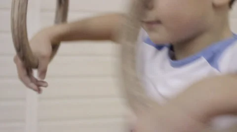 Young gymnast learn to perform gymnastic exercises Stock Footage 65215401