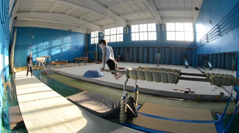 Young gymnast on the squared beams Stock Footage 36784836