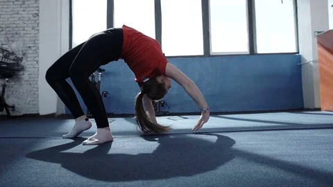 Young gymnastic doing backflip Stock Footage 75099705