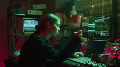Young hacker breaking password of credit bank card. Woman programmer infecting Stock Footage 160153981