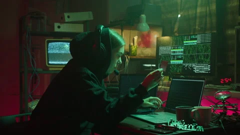 Young hacker breaking password of credit bank card. Woman programmer infecting Stock Footage 160941547