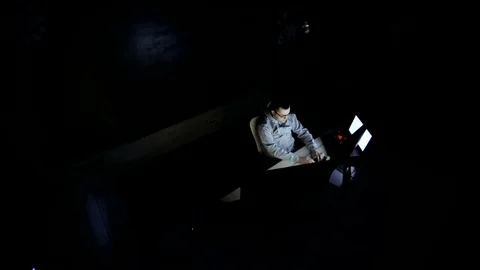 Young Hacker Breaks into Corporate Data Servers from His Underground Hideout Video stock 83879527
