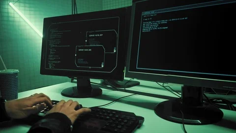 Young Hacker Breaks into Corporate Data Servers from His Underground Hideout Stock Footage 107643612