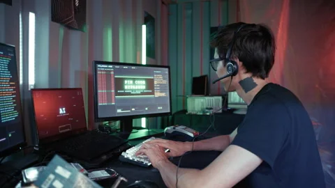Young hacker bypassing pin code security on computer Stock Footage 341660917