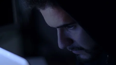 Young hacker in the dark typing on the computer - close up Video stock 90438433