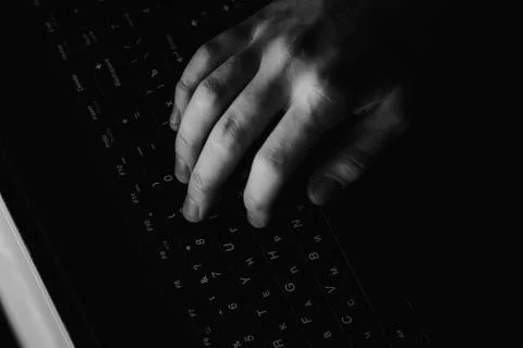 Young hacker in data security concept Stock Photos