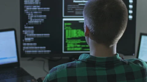 Young hacker trying to gain access to highly sensitive information Stock-Footage 142914421