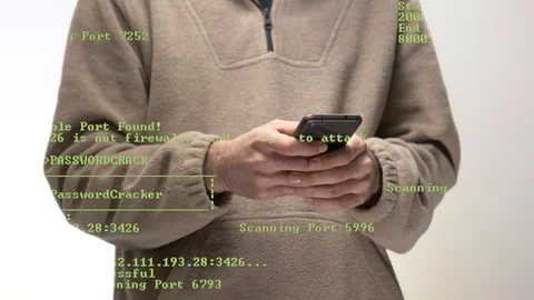 Young Hacker Using a Smartphone To Hack Password Stock-Footage 105296749