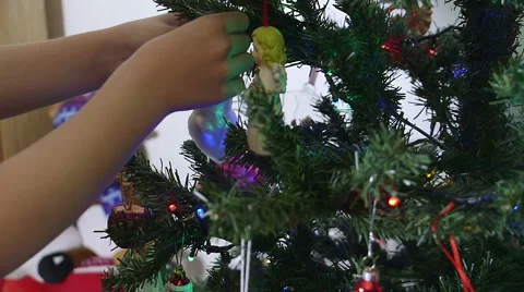 Young hands decorate Christmas Tree#2 Stock Footage 45662164