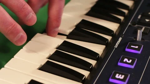 Young hands of man playing synthesizer Видео 62018745