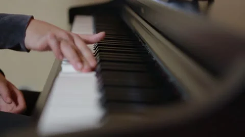 Young hands play all keys Stock Footage 55751928