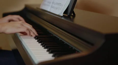 Young hands singing chopin opus Stock Footage 55751973