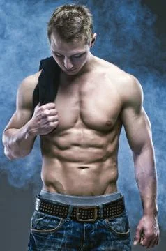 Young handsome athlete Stock Photos