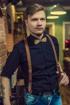Young handsome barber Stock Photos