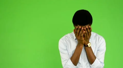 Young handsome black man cries  - green screen - studio Stock-Footage 45486189