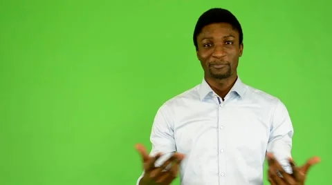 Young handsome black man talk - green screen - studio Video stock 45487938