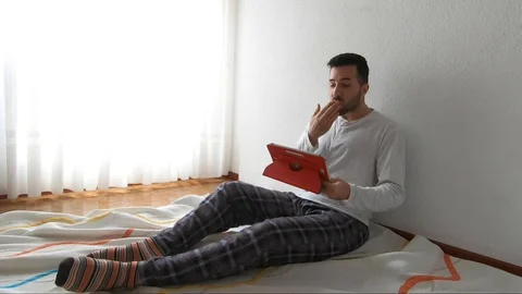 Young handsome boy making video call with family Stock Footage 128608142