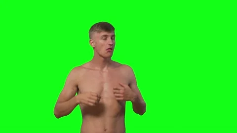 Young handsome guy fun parodies monkey.Neanderthal green screen Stock Footage 239663945