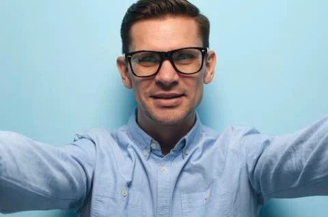 Young handsome guy office manager in formal wear and eyeglasses Stock Photos
