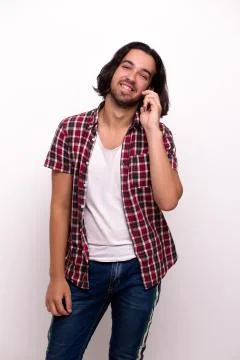 Young handsome guy posing casually isolated on white Stock Photos