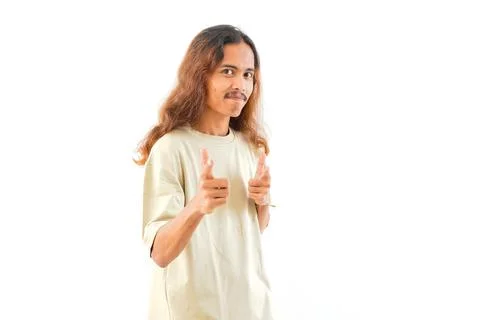 Young handsome Indonesian, Asian man in shirt, positive expression, joyful .. Stock Photos