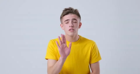 Young handsome Man asking for silence 库存影片 144958644