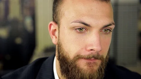 Young handsome man with beard thinking Stock Footage 70479937