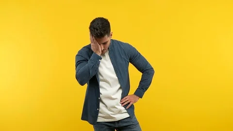 Young handsome man forgetful, realize something Stock Footage 97698721