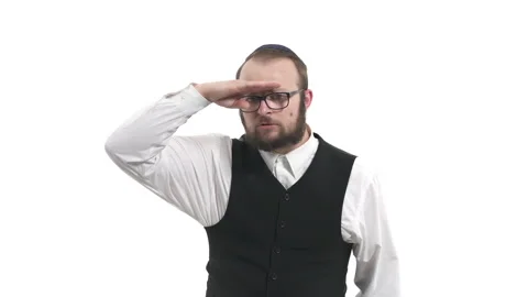 Young handsome man looking far away. Isolated, on white background Stock Footage 130185016