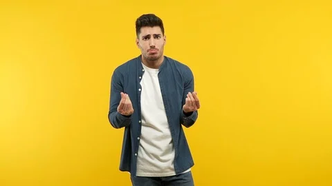 Young handsome man making a gesture of need Stock Footage 97698858