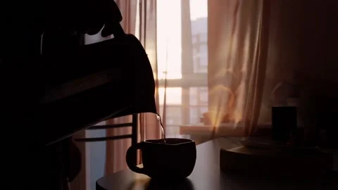 Young handsome man making a tea In kitchen Stock Footage 145185640