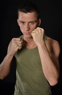 Young handsome man posing in the studio. Stock Photos