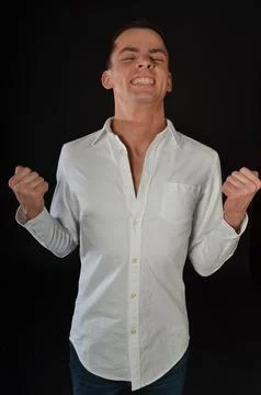Young handsome man posing in the studio. Stock Photos